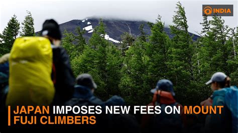 Japan imposes new fees on Mount Fuji climbers to .